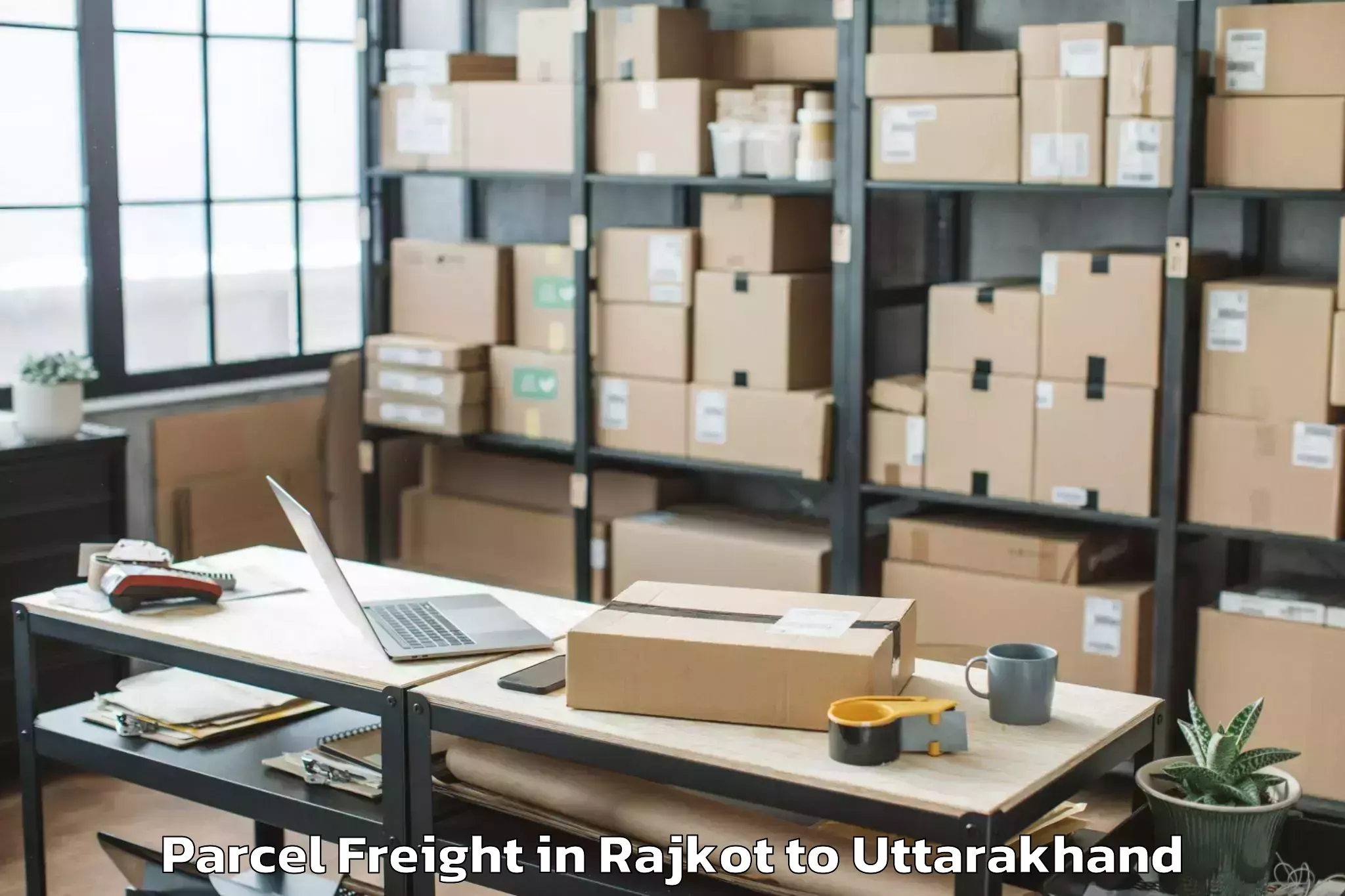 Hassle-Free Rajkot to Dhoomakot Parcel Freight